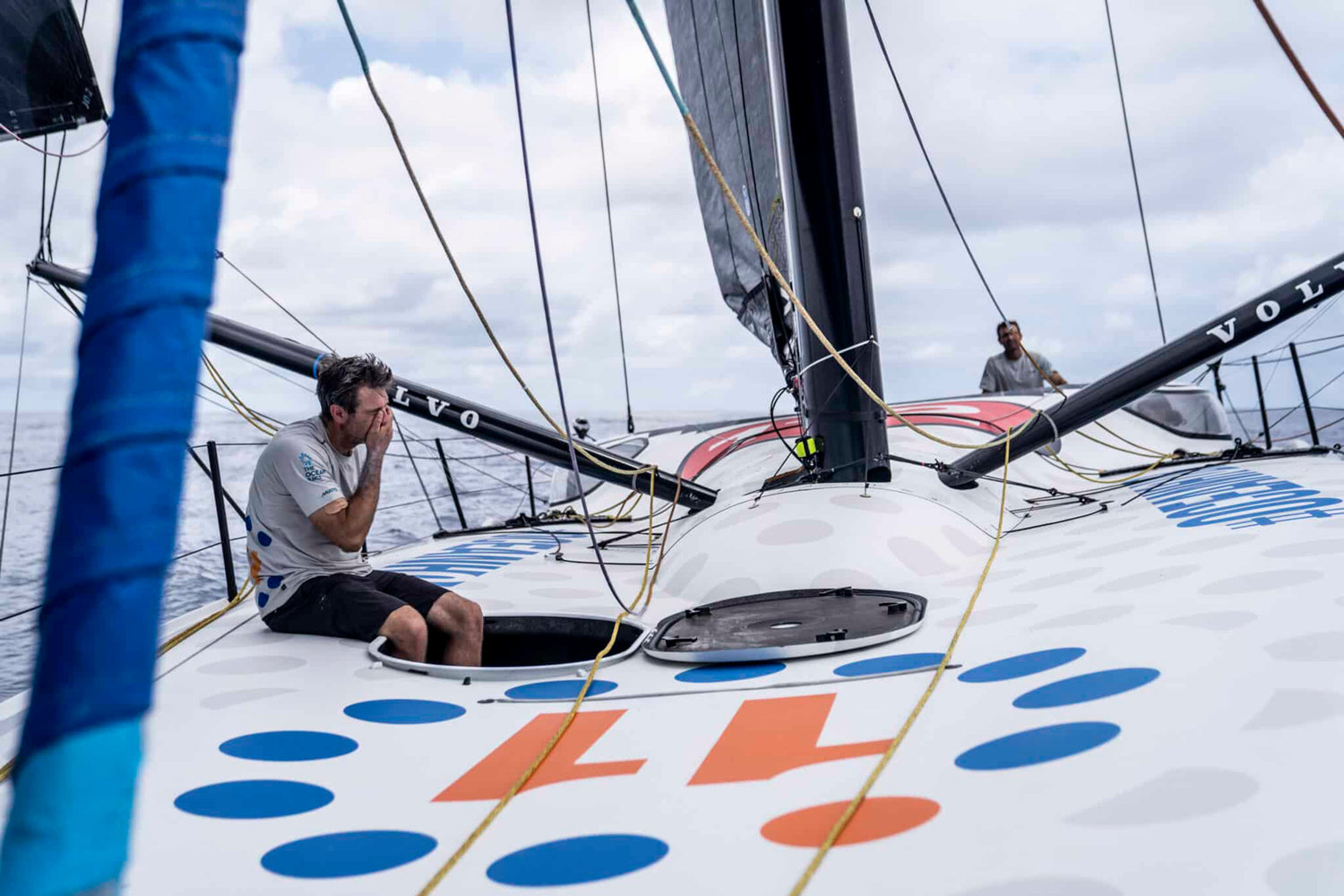 29 January 2023, Onboard 11th Hour Racing Team during Leg 2 from Sao Vicente, Cabo Verde, to Cape Town, South Africa...Simon Fisher takes a breather on deck where, even in the sweltering doldrums, it’s cooler than inside.
