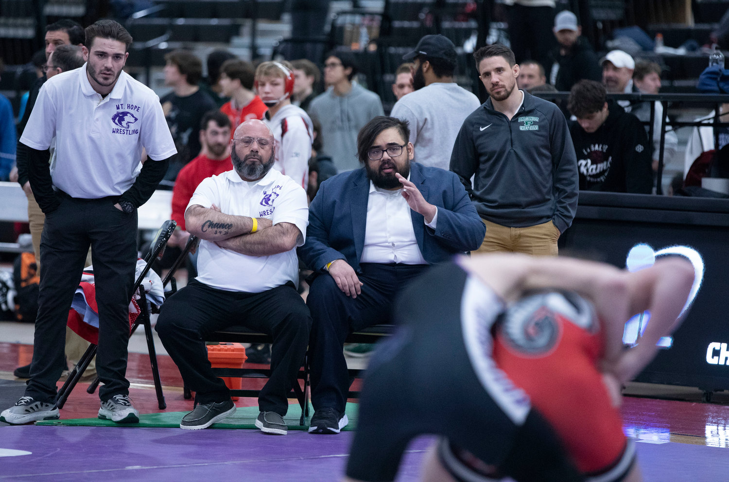 Assistant coaches Trevor King (left), Brad Oliver and head coach Ryan Fazzi look on during Andrew McCarthy’s semifinals match against Stone Farnsworth of Coventry.