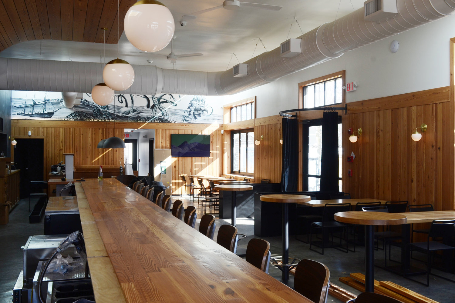 Natural light shines illuminates the interior of the new restaurant space, which features seating for 60.