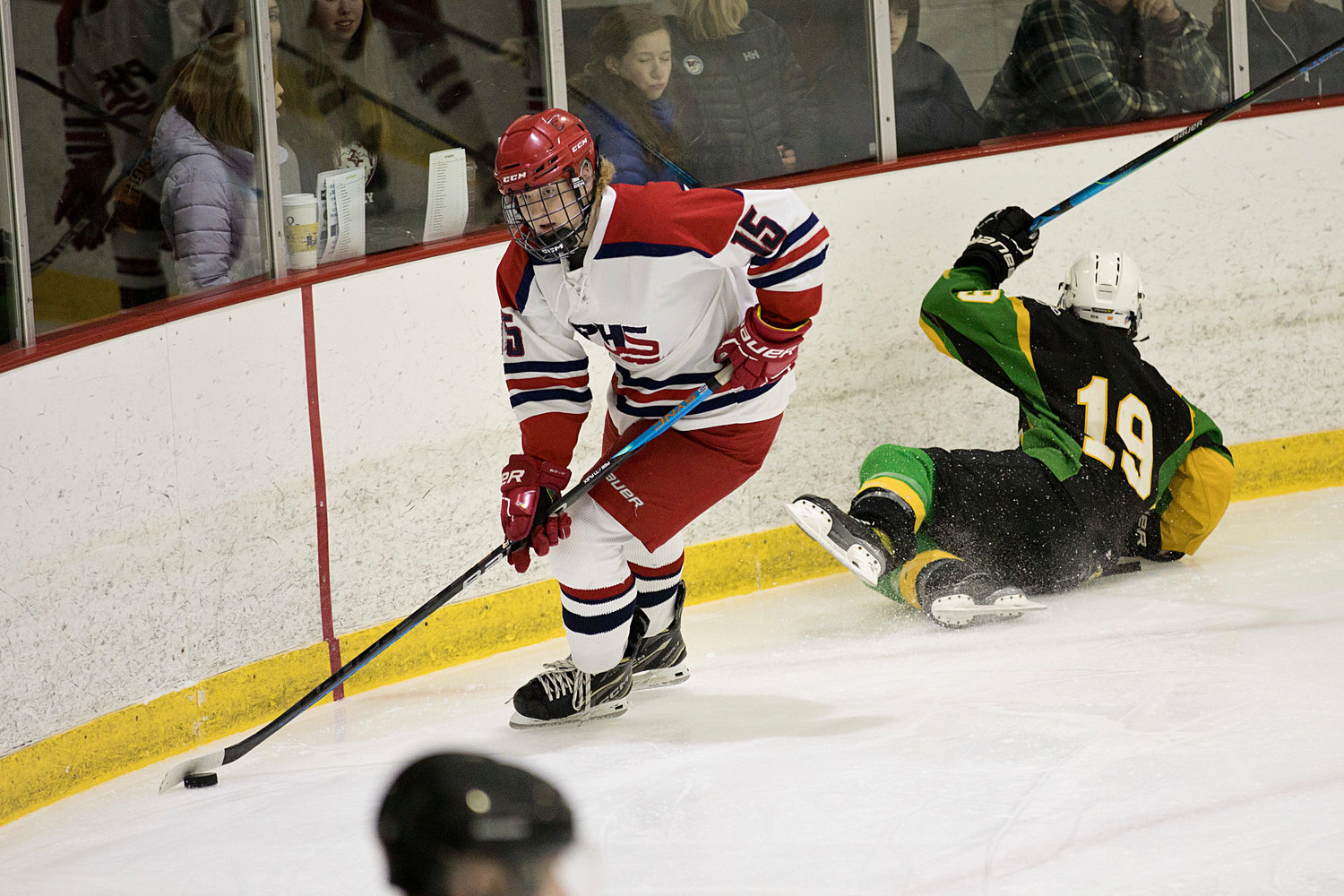 Shane Temple leaves his opponent in the shavings to take control of the puck.