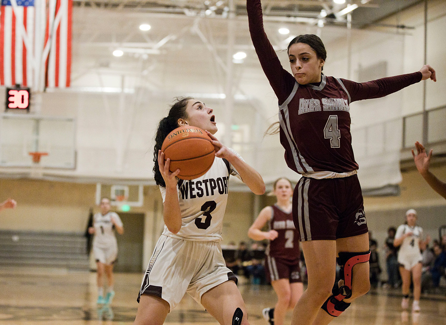 Korynne Holden is pressured while making a shot during the second half of Tuesday's playoff game. 