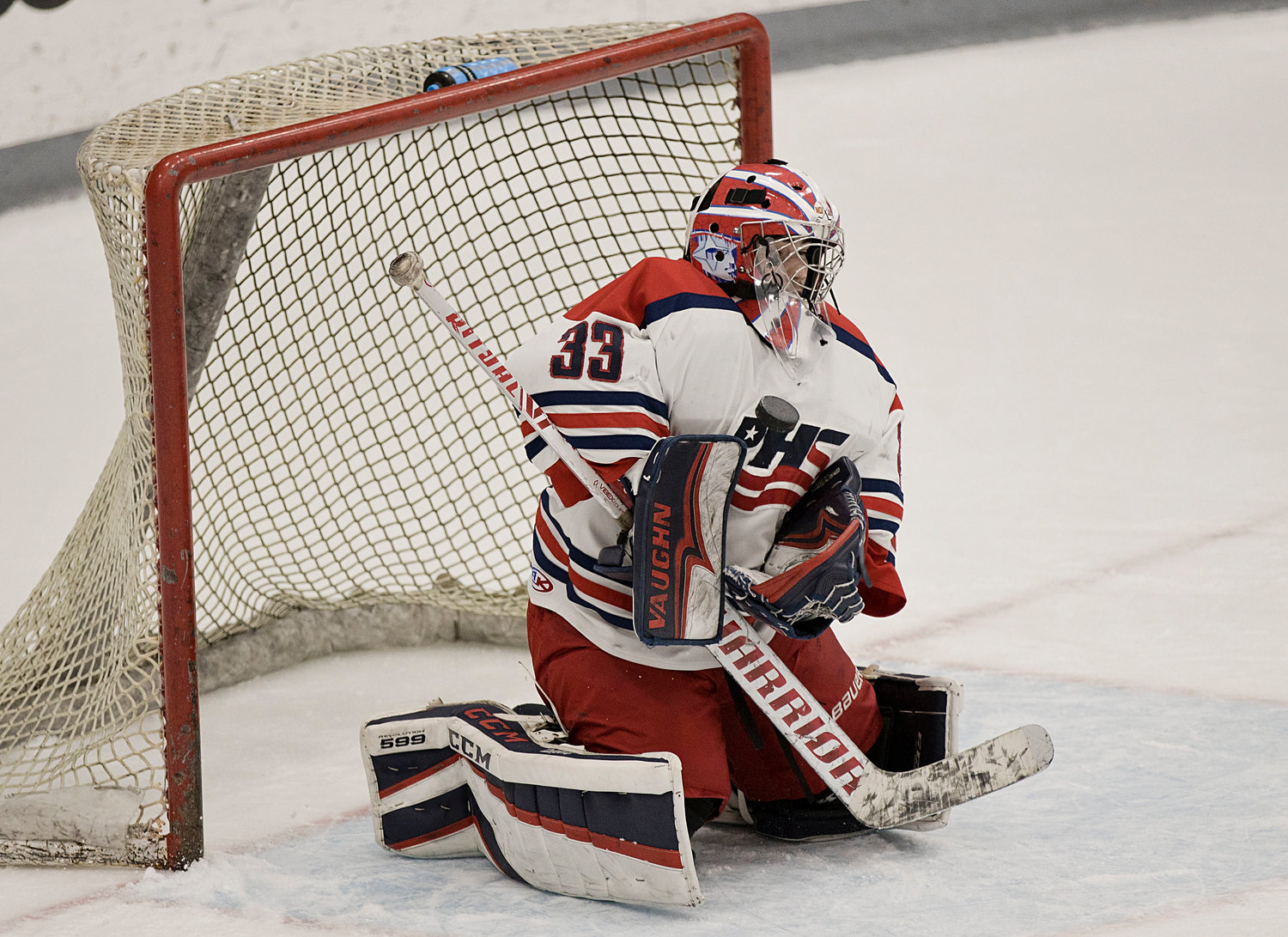 Goalie Stephen Dutra uses his chest to stop a shot during the second period.