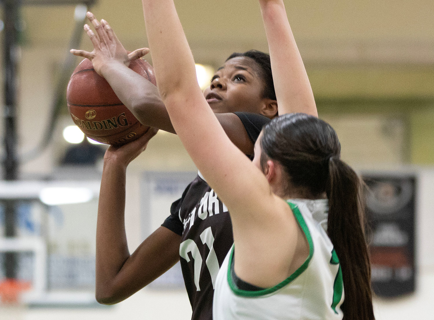 Jenna Egbe puts back a rebound in the second half. The sophomore center finished with 5 points.