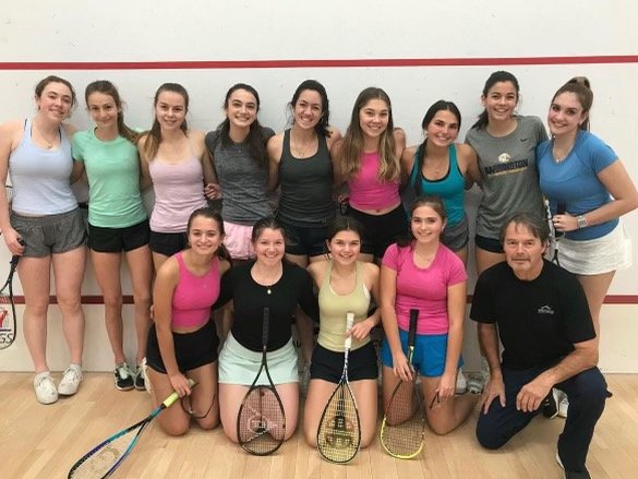 Some members of the Barrington High School Squash Club pose for a photo prior to a recent match.