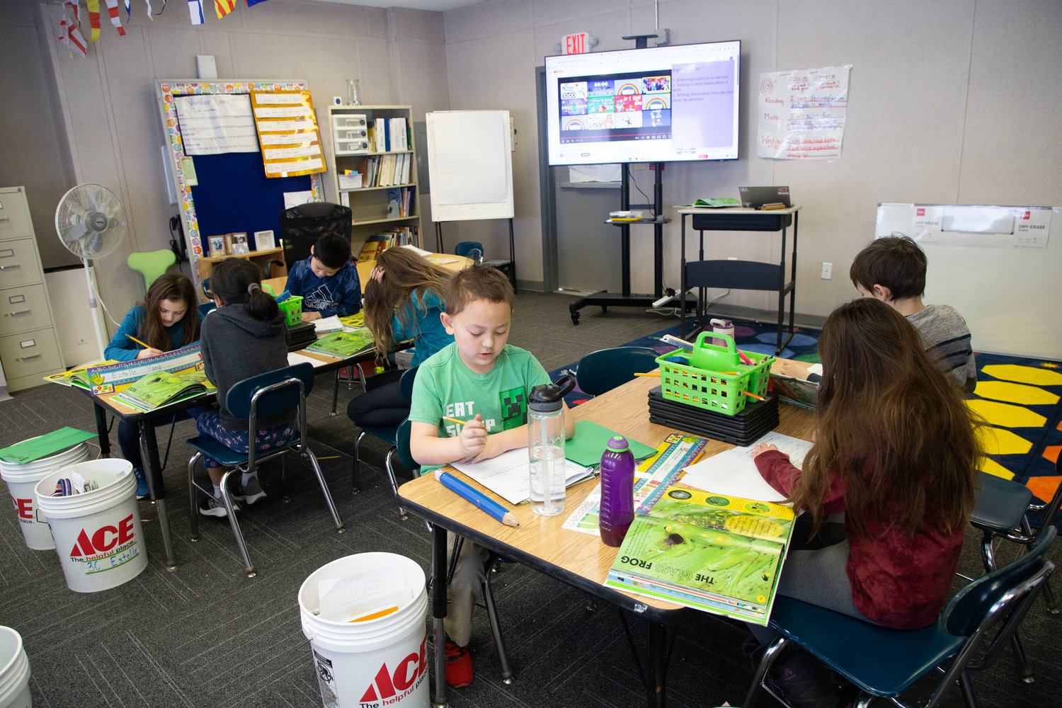 Third-graders work through a lesson inside one of the new modular classrooms at Primrose Hill School.