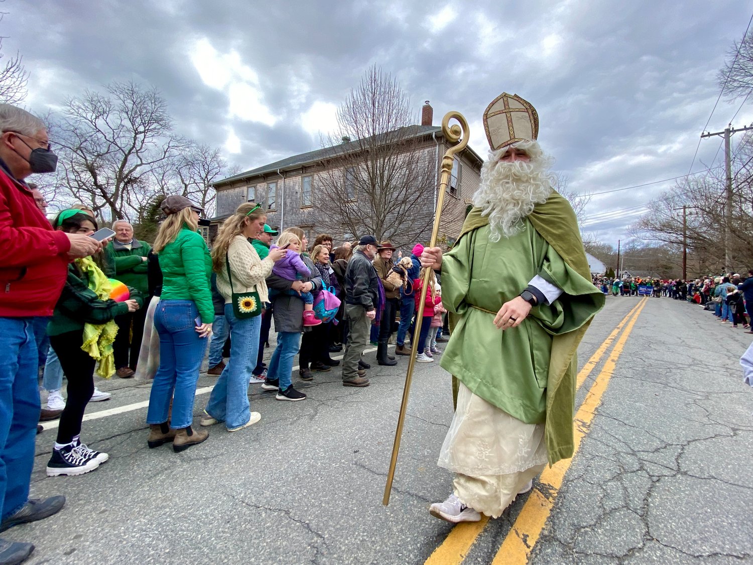 St. Patrick, the man of the hour, brought loud cheers as he made his way down the route.