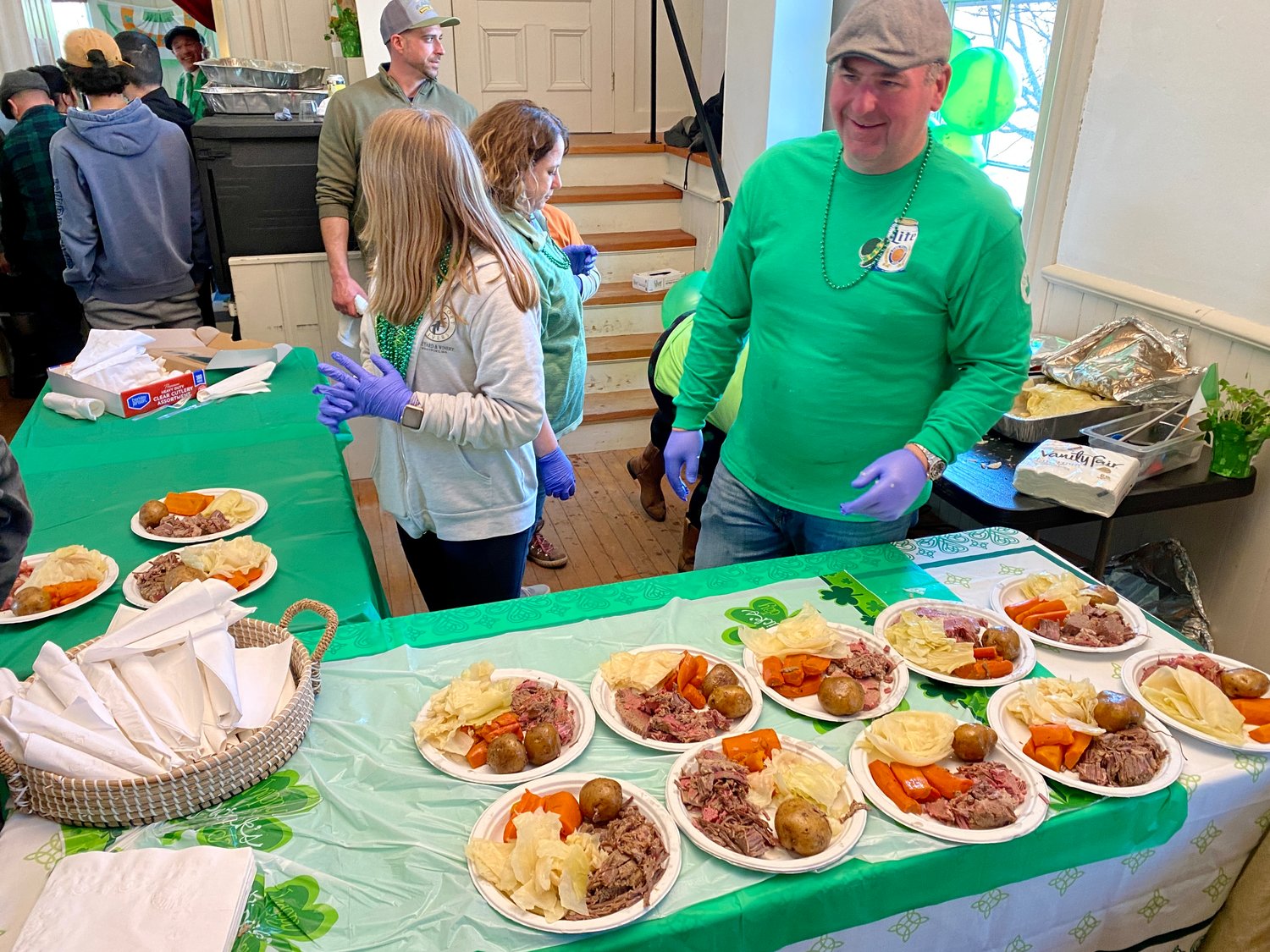 Fred Melnyk of Bootleg BBQ in Westport donated his time, cooking and serving 130 Irish dinners after the parade.