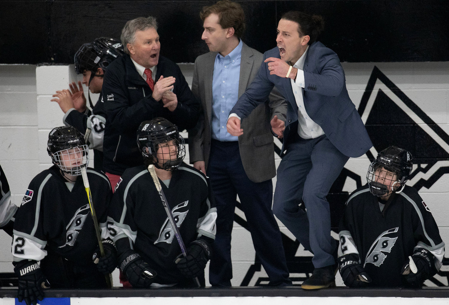 Hurricanes head coach Johnny Sheil (right) and his coaches bark out orders with under 2 minutes to play in the game and RMT holding a brief 2-1 lead.