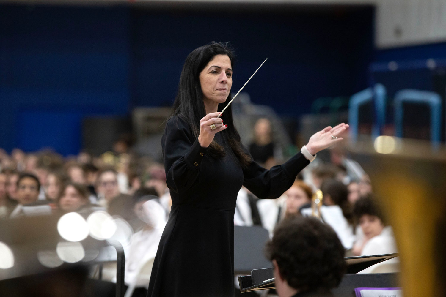 Superintendent Ana C. Riley performed as a special guest conductor for the high school band in Brian Balmages’ “Among the Clouds.”