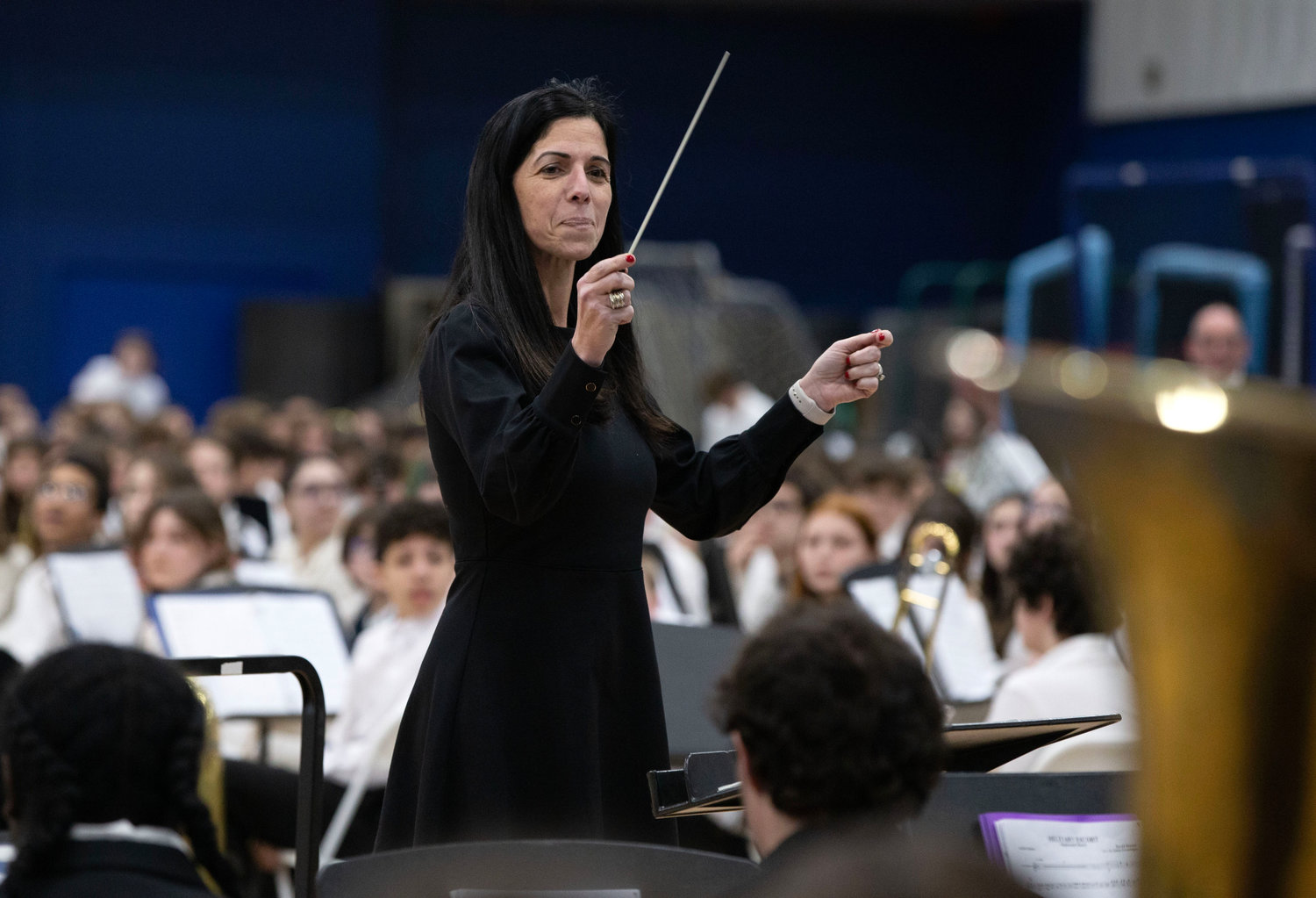 Superintendent Ana C. Riley performed as a special guest conductor for the high school band in Brian Balmages’ “Among the Clouds.”