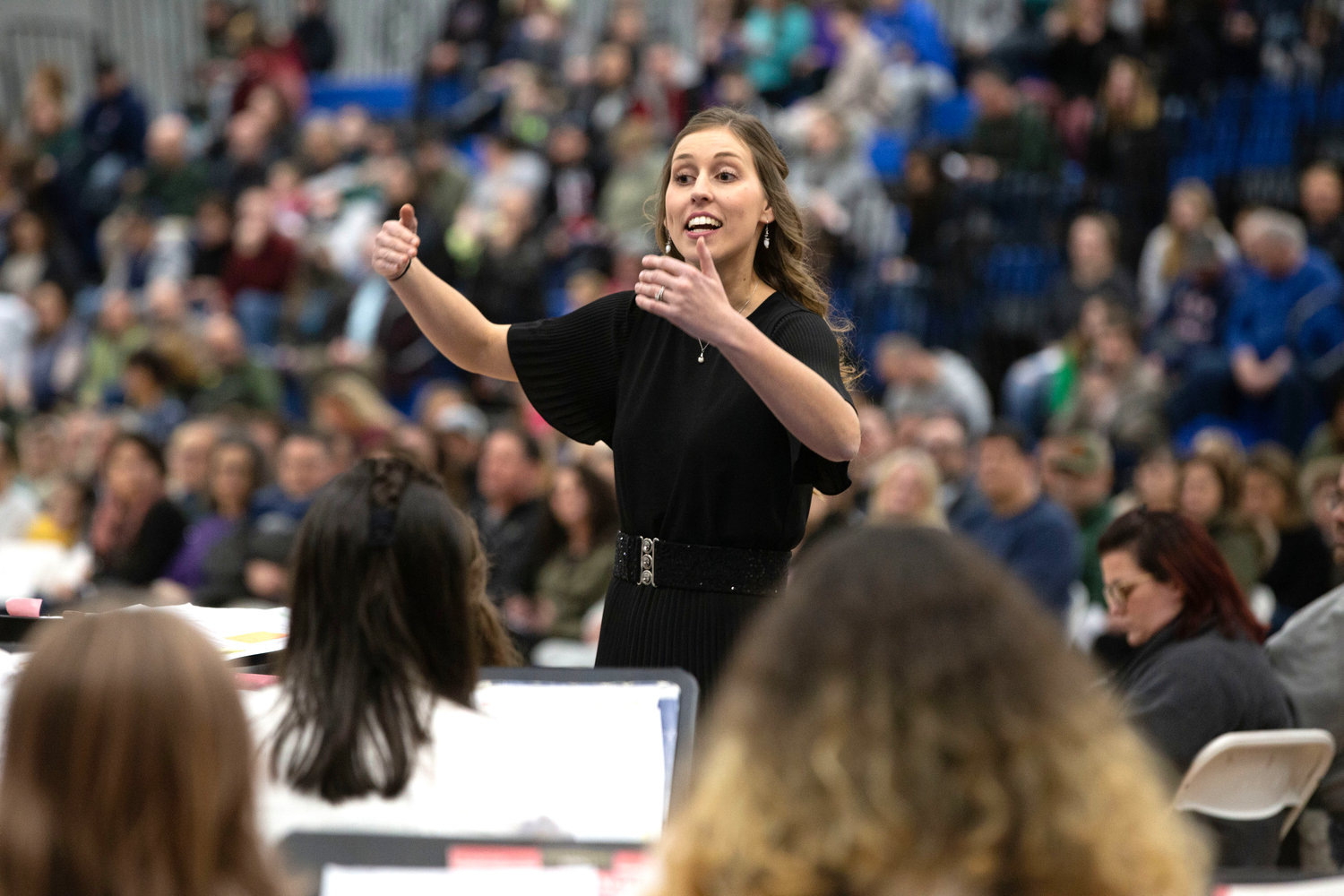Lily Pavao Dion directs the Kickemuit Middle School Band during Skip It, Lou.
