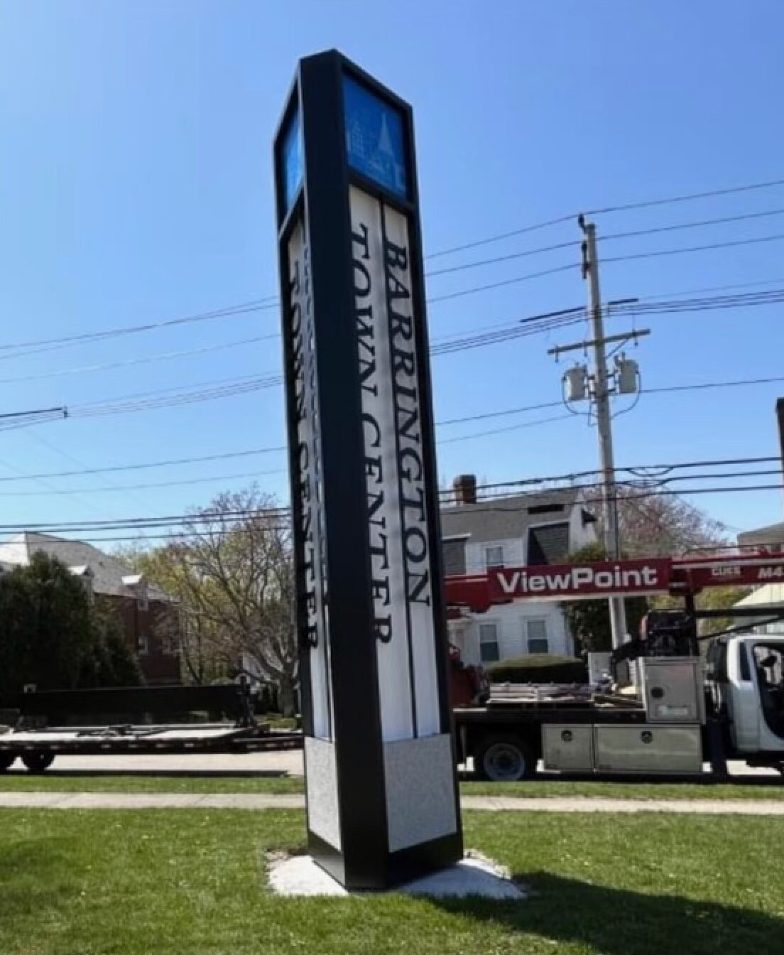 Vertical monument signs including the words “Barrington Town Center” were installed in two locations along County Road recently.