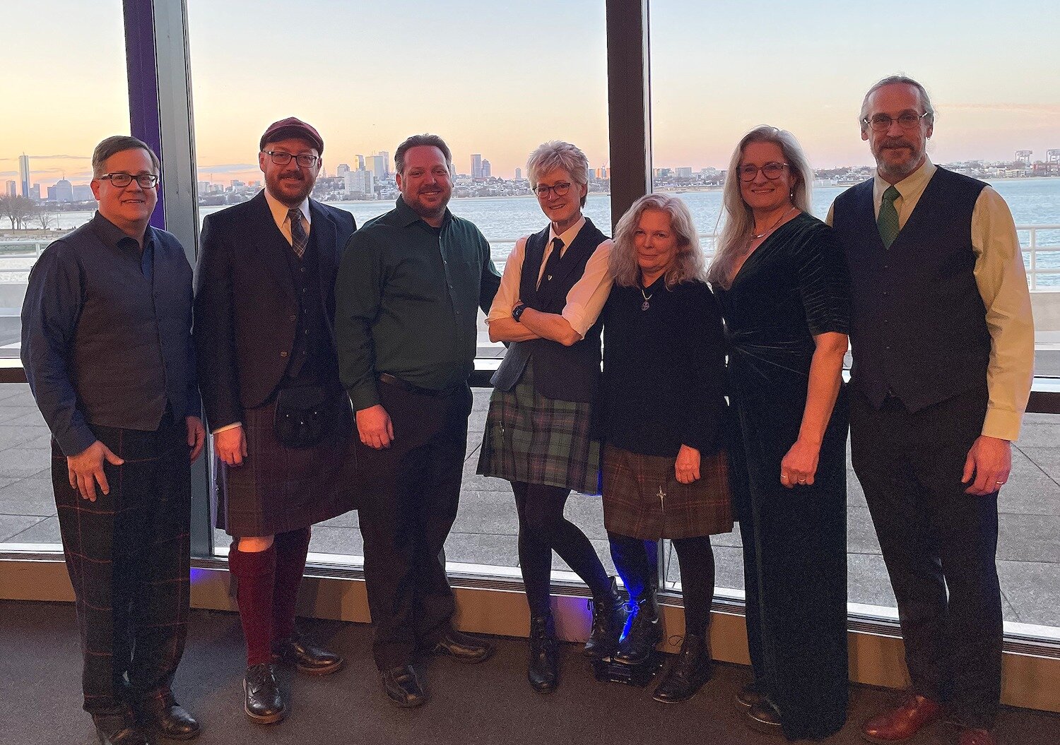 The Celtic band Fellswater, including Diane and Chris Myers, performed recently at the JFK Library, with Boston Harbor and the Boston skyline in the background.