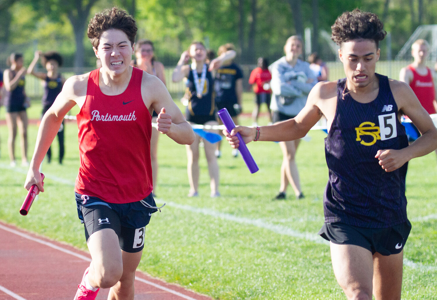 Portsmouth High’s Aidan Chen nearly caught the best runner in the state, Devan Kipyego of St. Raphael Academy, in the 4x400-meter relay race during the Eastern Division track and field championships over the weekend. The PHS team ended up taking second place.