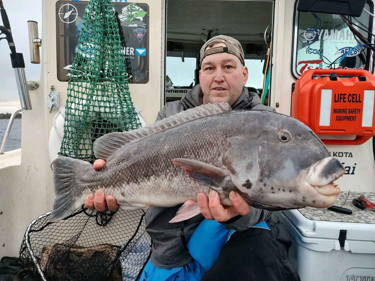 Al Zuppe with a tautog caught on Flippin Out Charters, Portsmouth using a green crab and one of Al’s yellow Asylum Jigz.”
