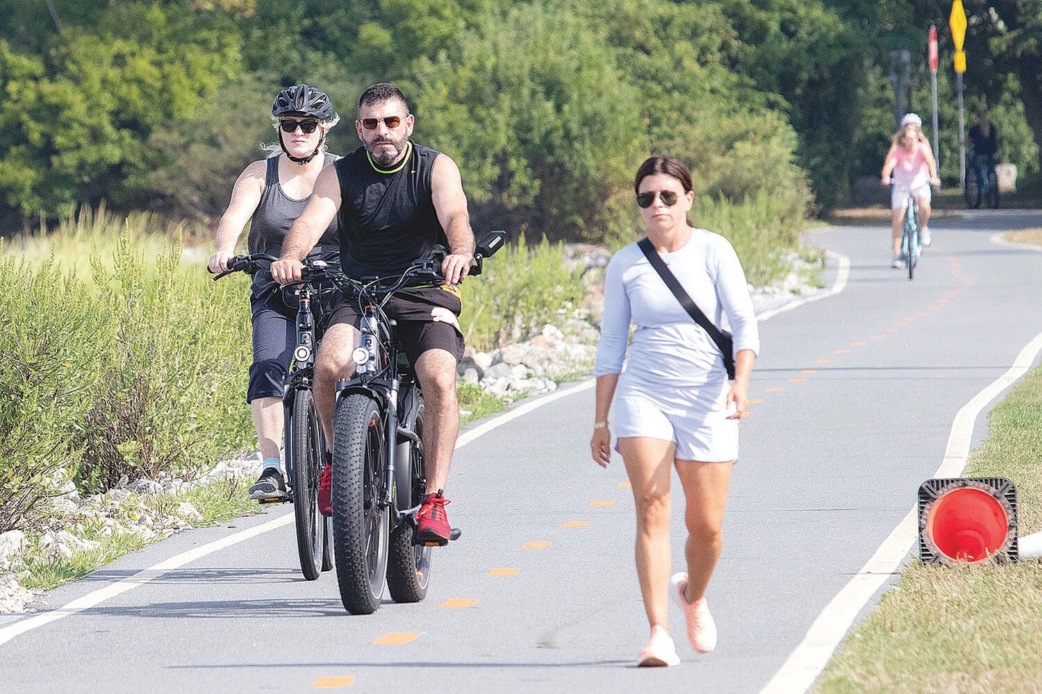 The Rhode Island General Assembly is considering a bill that would make electric bicycles legal on all the state’s bike paths, including the East Bay Bike Path, shown here during a warm day last summer. The bill was approved by a House committee earlier this month, and it may be heard by the full House of Representatives this week.
