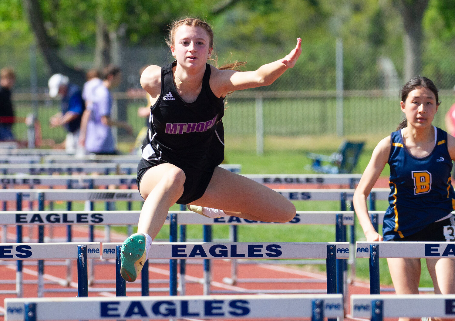 Sophomore Lola Silva places fifth in the 110 meter hurdles. She also placed second in the long jump with a leap of 16 feet 5 inches and placed fourth in the 300 meter hurdles.