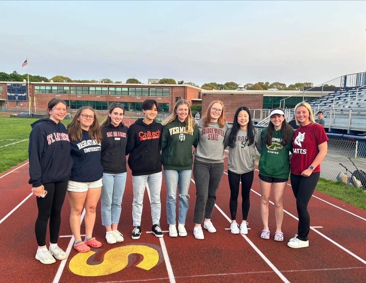 A group of BHS student-athletes who will play sports in college pose for a photo recently.