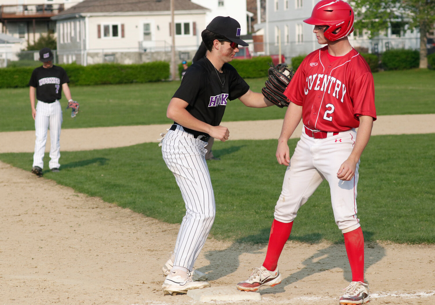 Rocco Ferrolito slaps a late tag on a Coventry runner getting back to third base.