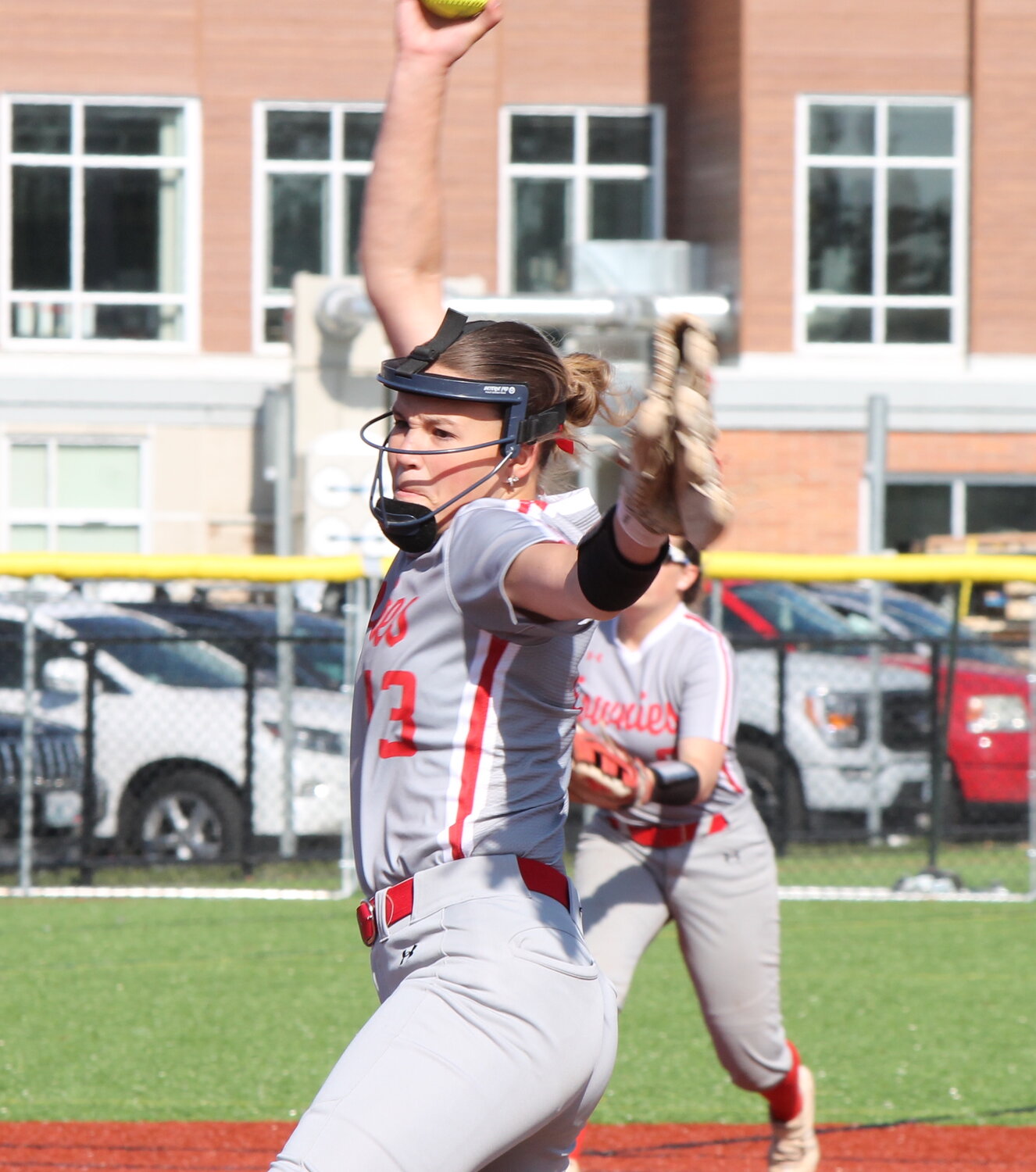 Keira Quadros delivers a pitch during the five-inning, perfect game she tossed in East Providence's 13-0 victory over visiting Moses Brown Wednesday afternoon, May 17.