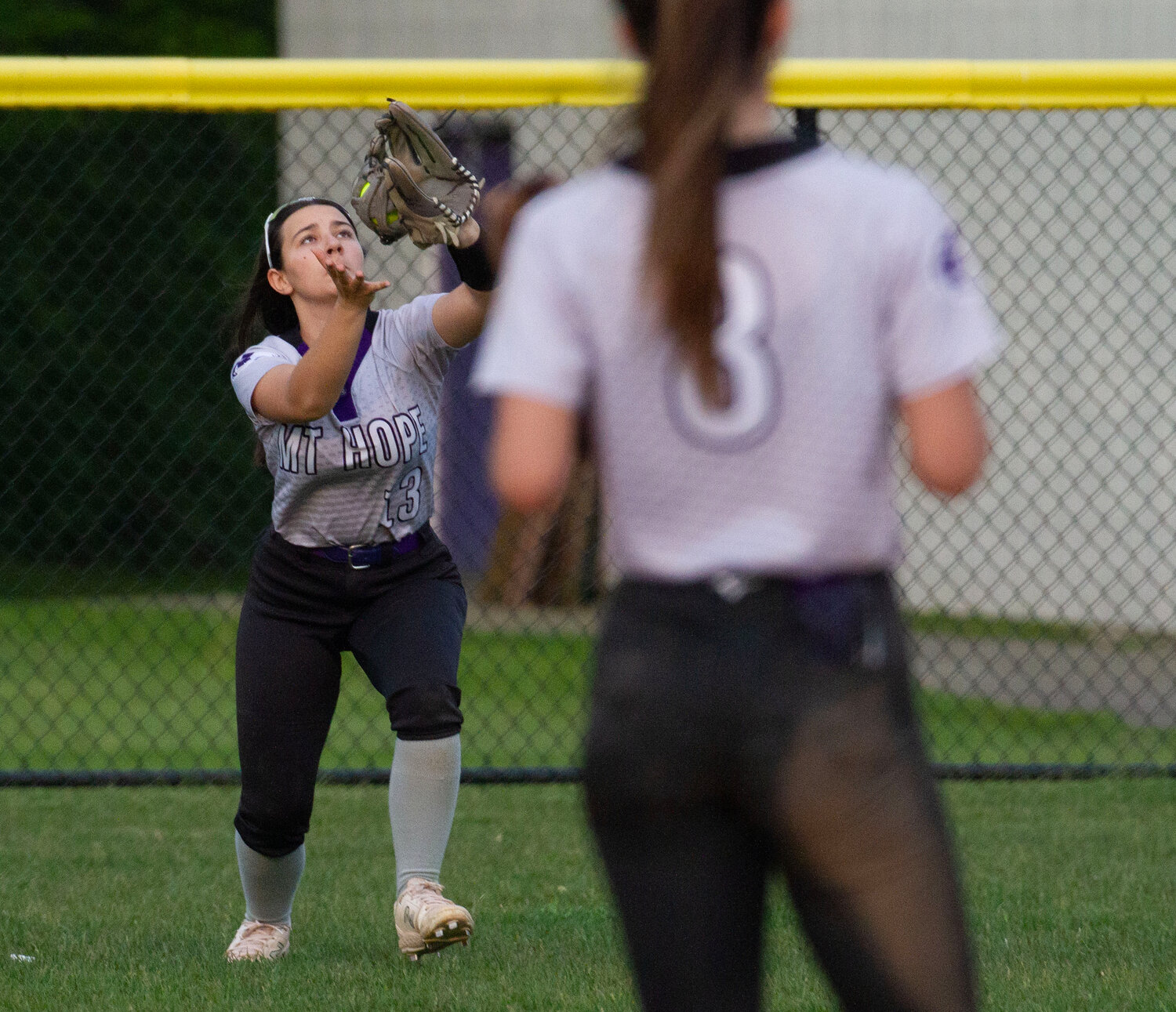 Sofia Haberman makes a catch on a fly ball to right field during the Woonsocket game.