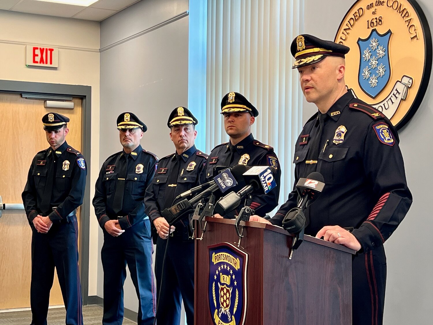 Portsmouth Police Chief Brian Peters briefs members of the media during a press conference Tuesday at the police station. The other officers are (from left) Detective Lt. Lee Trott; Capt. Richard Ruest, in charge of the patrol division; Capt. John Cahoon, in charge of the administrative division including detectives; and Maj. Michael Morse, deputy chief of police.