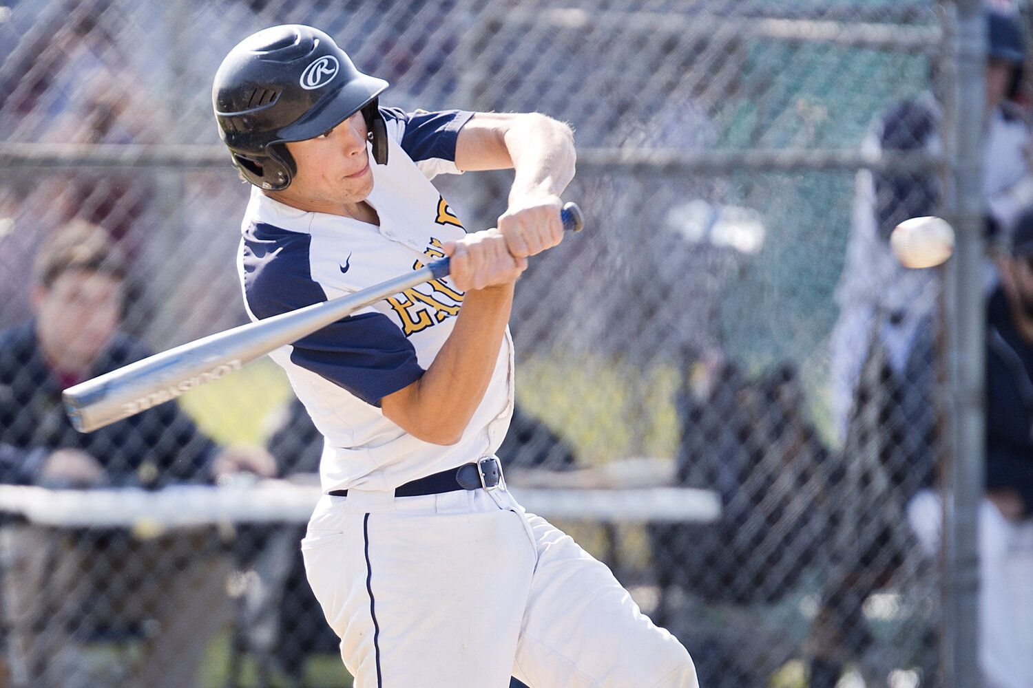 Eli Terrell makes contact while at bat against Mount St. Charles, Thursday.