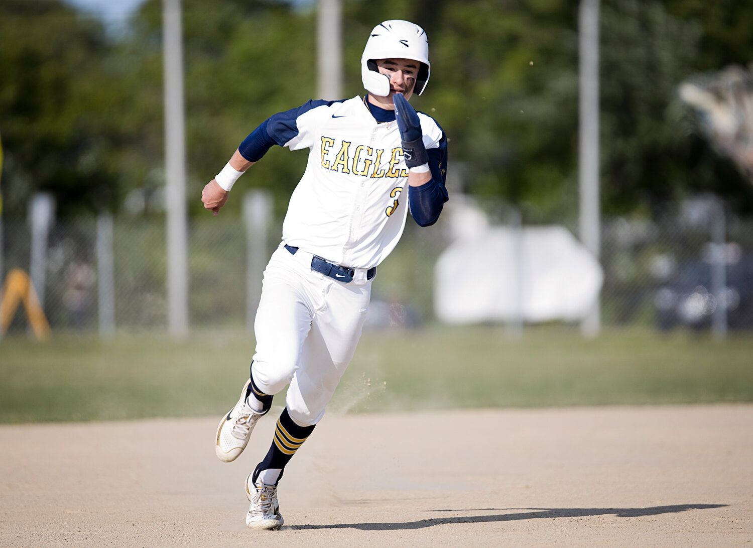 Quinn Murphy rounds the bases while competing against Mount St. Charles, Thursday.