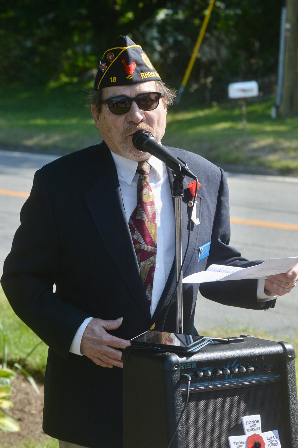 Francis “Cisco” Gutierrez, commander of American Legion Post 18, welcomes everyone to Legion Park outside Town Hall.