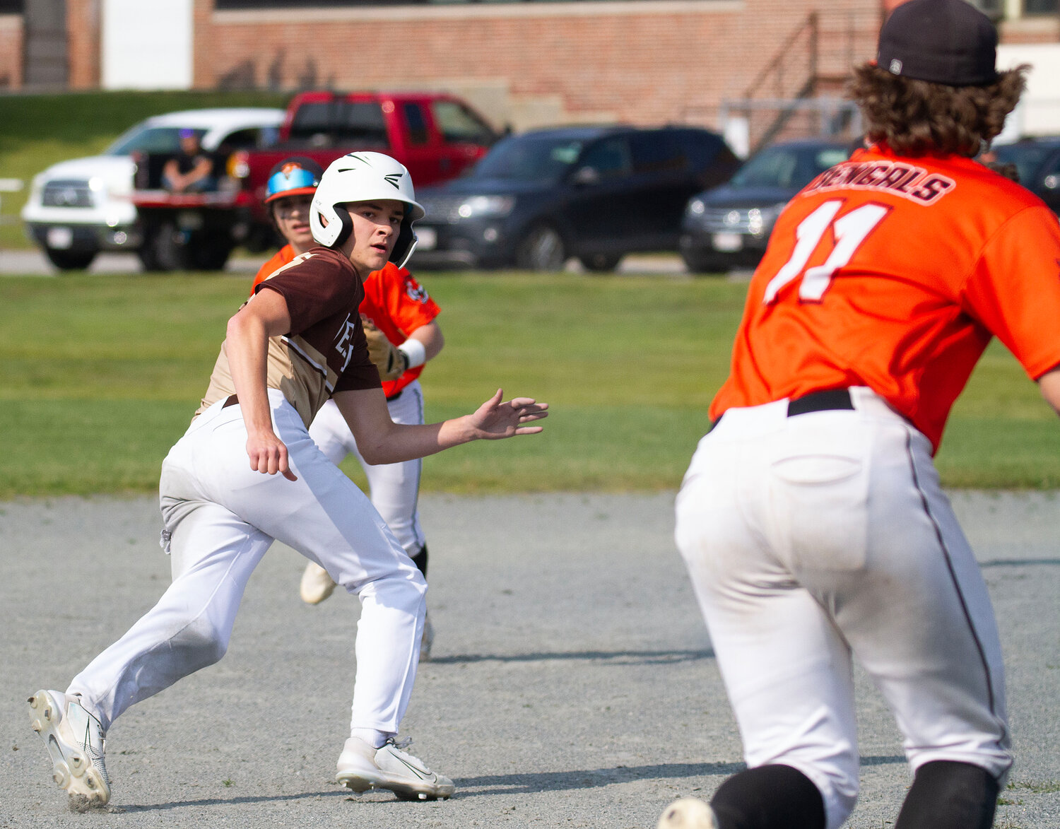 Cam Leary steals second base and gets caught in a rundown during the Wildcats’ 8-0 home win over Diman on Tuesday. Leary the Wildcats’ speedy centerfielder batted .259 also helped out on the mound earning a record of 2-1 with an ERA of 4.08.
