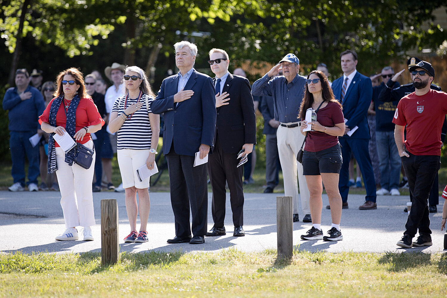 A large crowd gathers at Victory Gate for a wreath laying ceremony during Barrington's Memorial Day services, Monday.