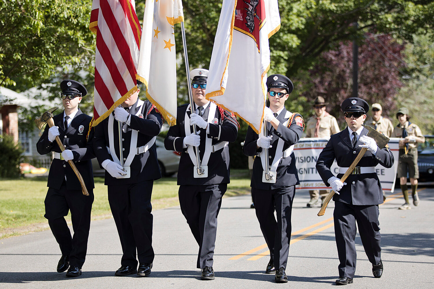 The Barrington Fire Department's Color Guard leads Barrington's Memorial Day parade up Upland Way.
