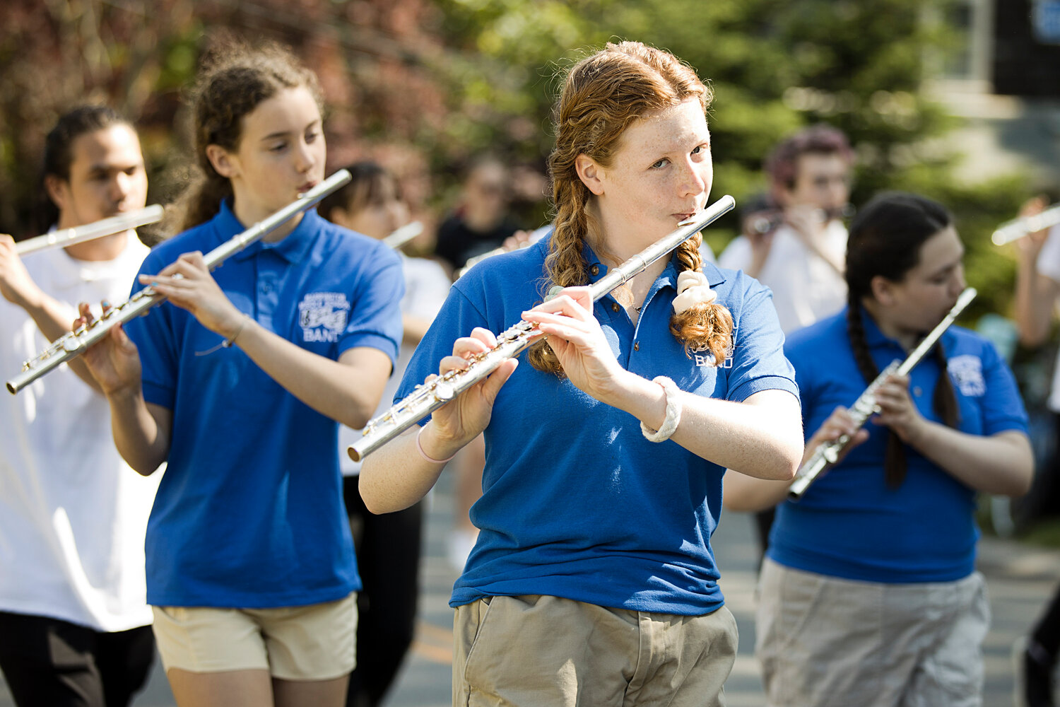 Members of the Barrington Middle School band play music while marching in the town's Memorial Day parade, Monday.
