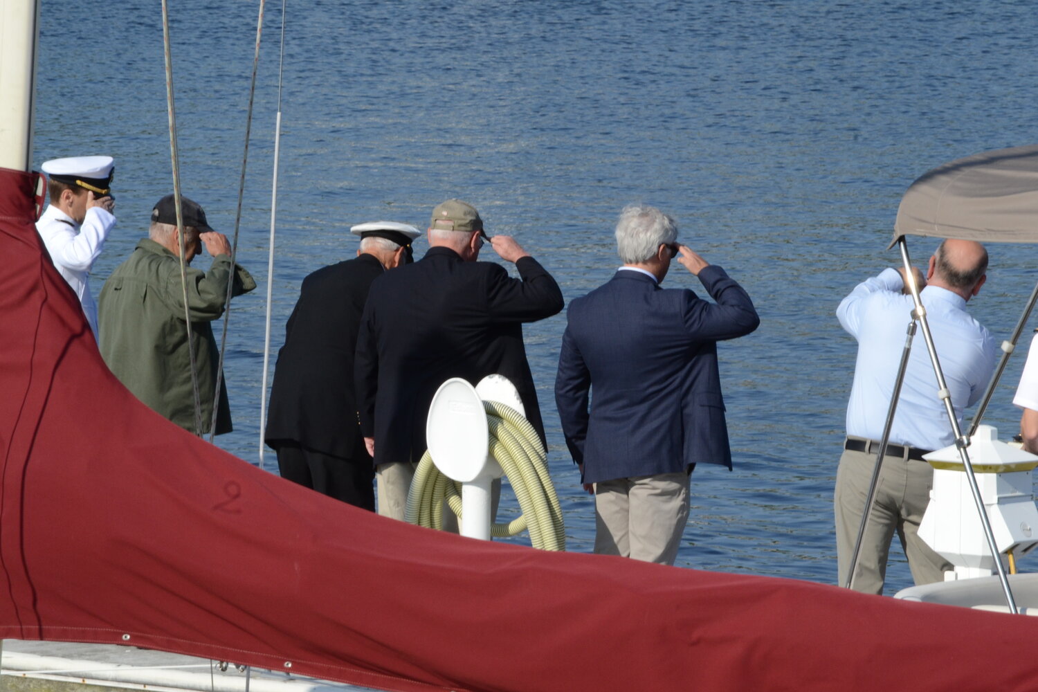 A ceremonial laying of a wreath in the water off the Town Wharf began the day of ceremonies on Monday morning.