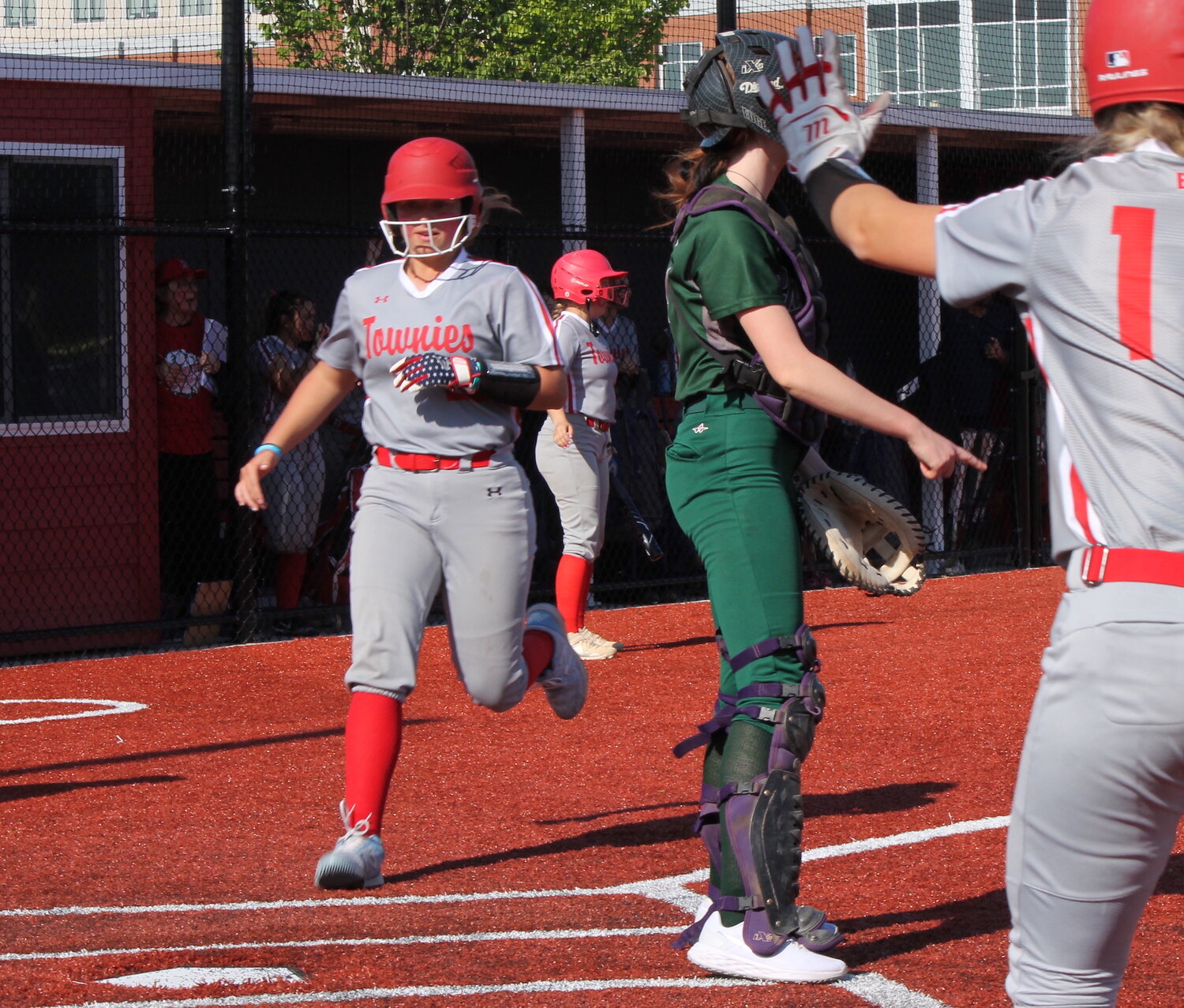 EP's Emma Boisseau crosses the plate with the second and eventual game-winning run after Emma Bergeron tripled in the bottom of the sixth inning.