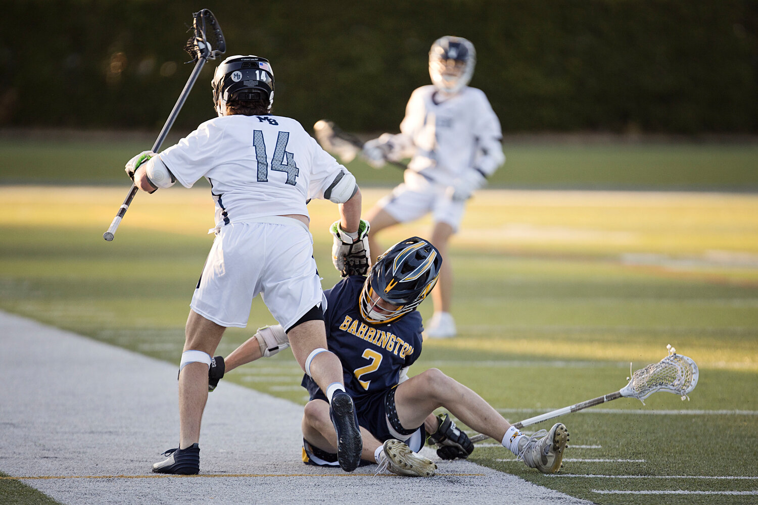Ben Parylak collides with a Moses Brown opponent while attempting to take possession of the ball.