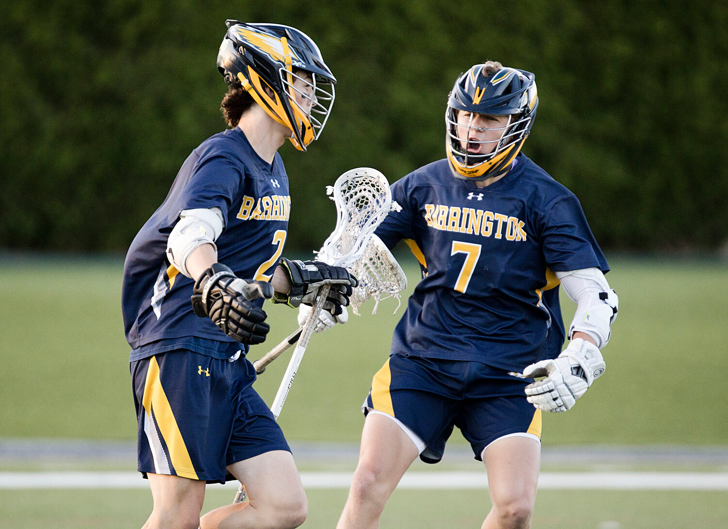 Ben Parylak (left) and Colin Hope celebrate a goal while battling Moses Brown in the Division I Semifinals, Tuesday.