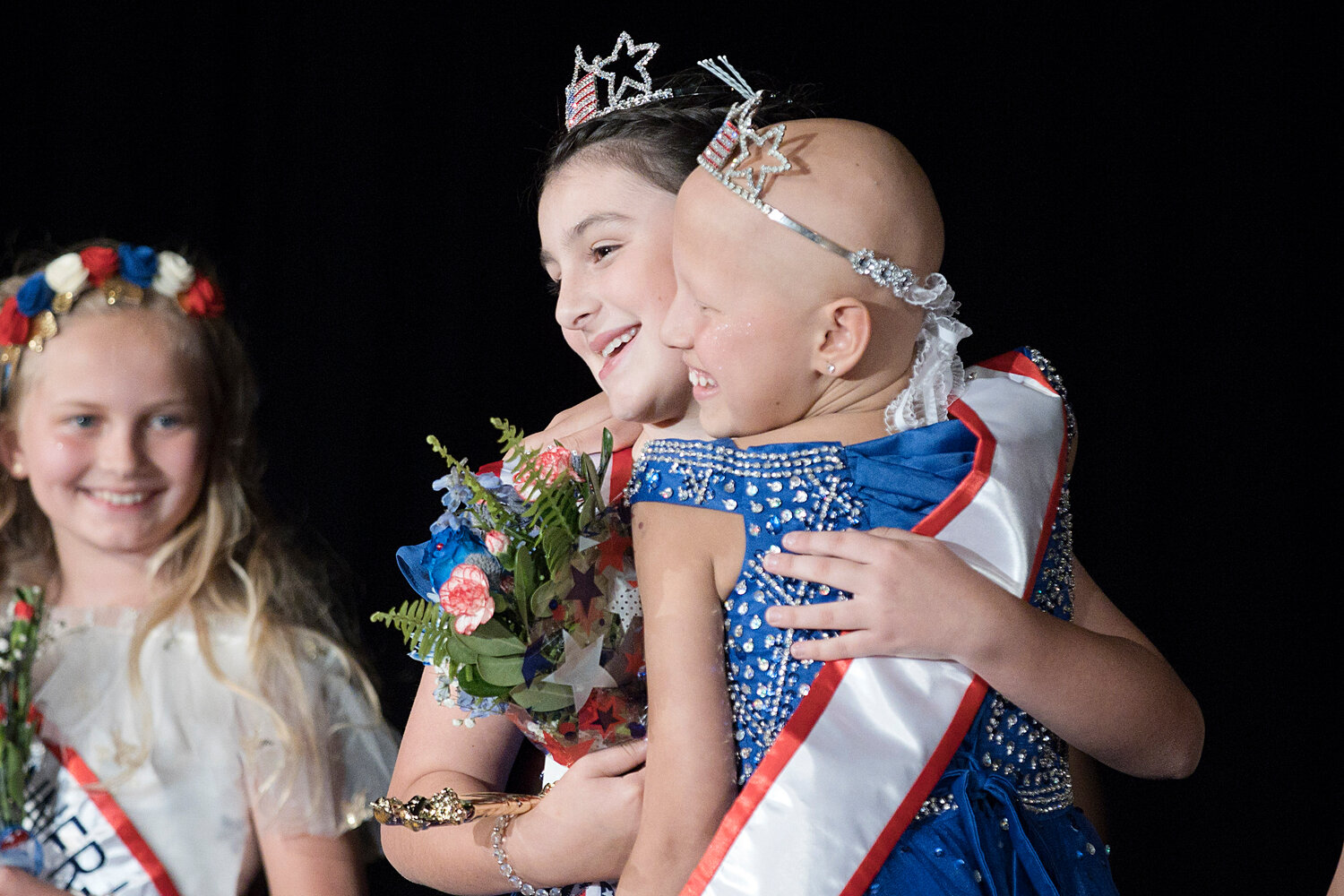 2022 Little Miss Fourth Alana Crowell (right) congratulates Charlotte Loftus after she is crowned the 2023 Little Miss Fourth.