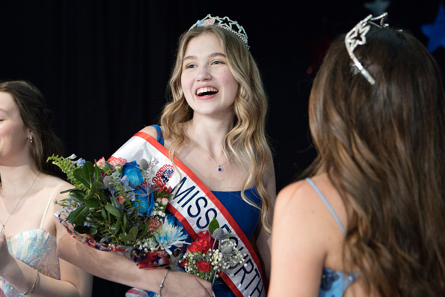 Casey Little smiles toward the applause after being named Miss Fourth of July in Bristol's 75th annual pageant, held Saturday night at Mt. Hope High School.