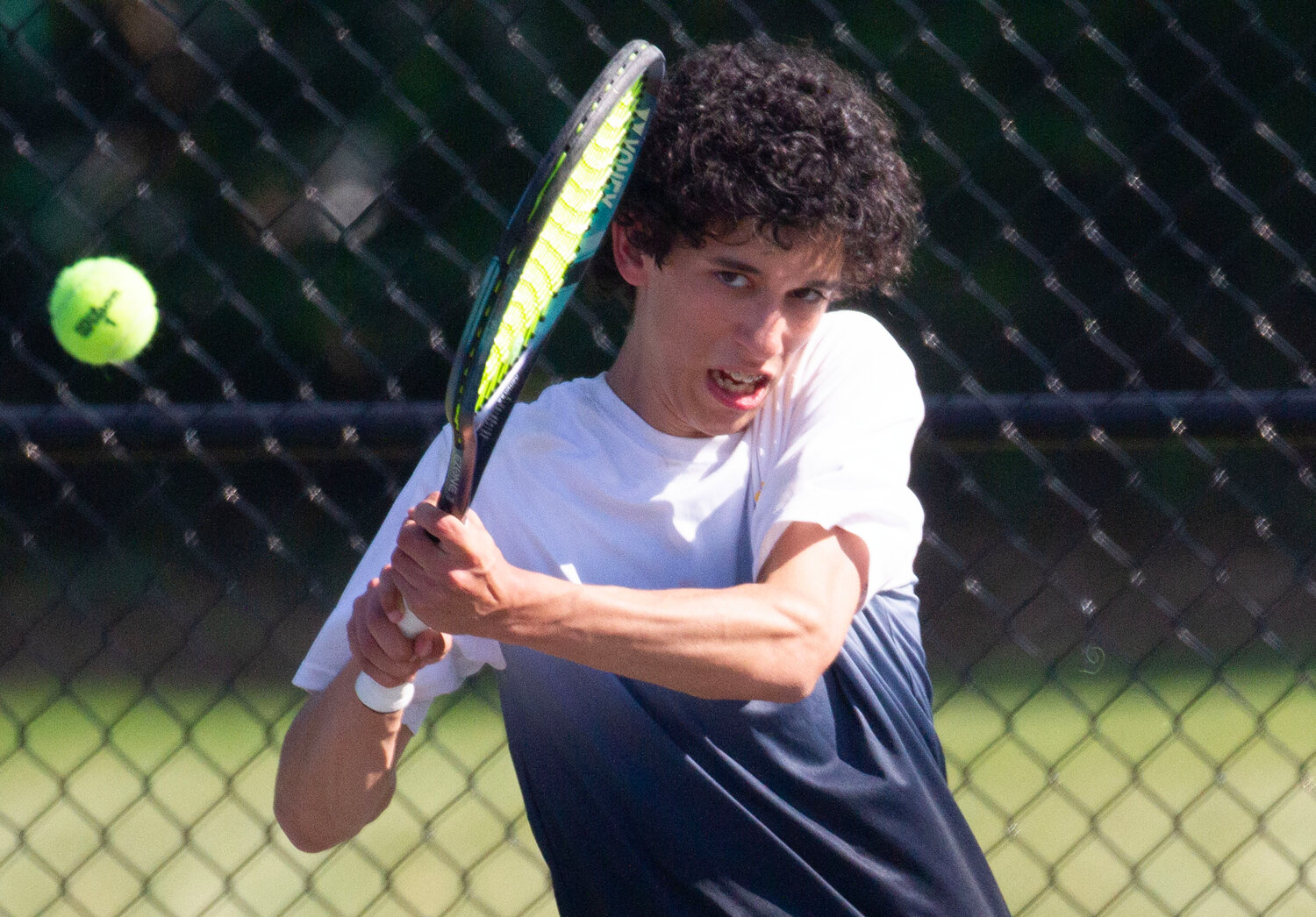 Barrington's Luke Sapolsky watches his shot during his match at number one singles.