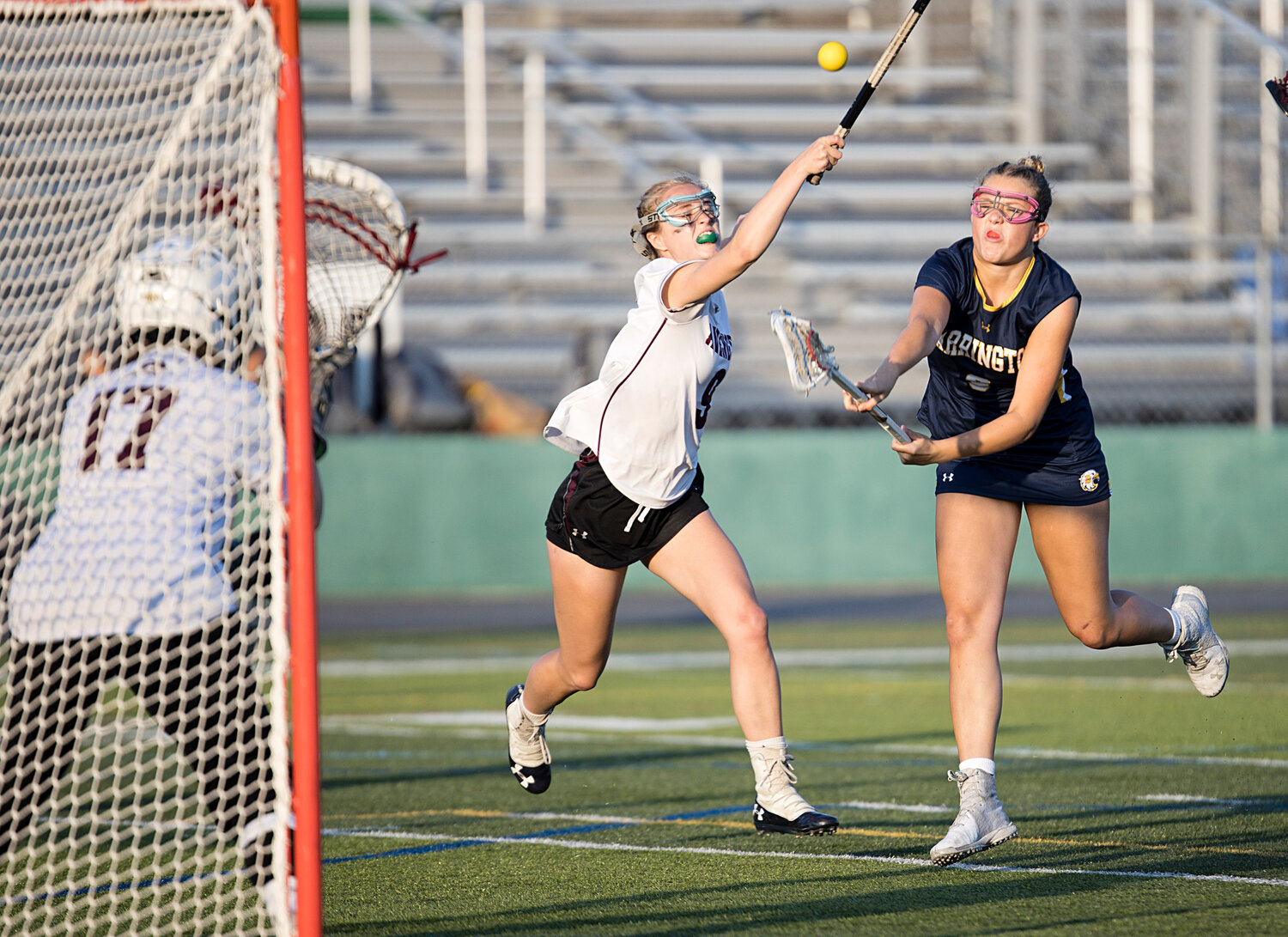 Alexandra Hope fires a shot into the net while battling East Greenwich in the Division I semifinals, Thursday.