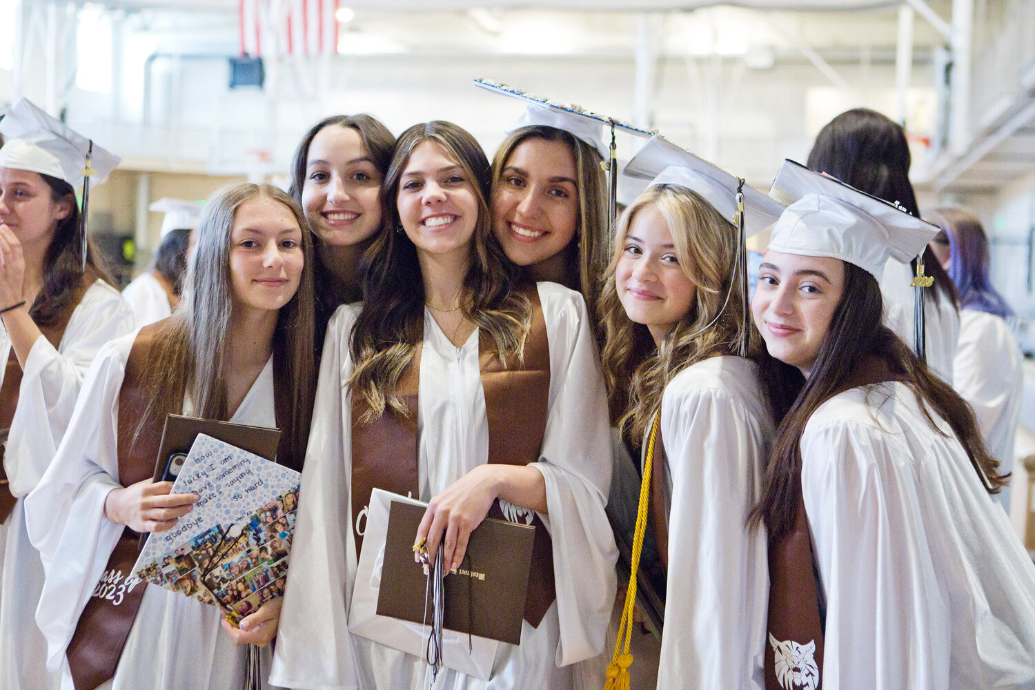 Graduates celebrate in Westport Middle-High School's gymnasium. 