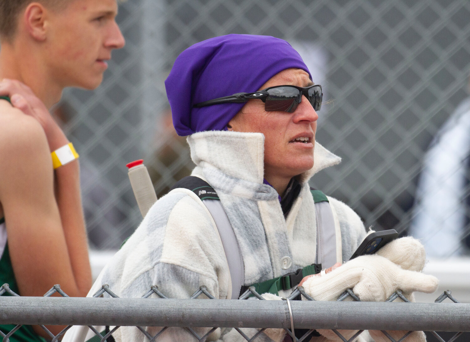 Coach Renae Cicchinelli looks on during the meet.