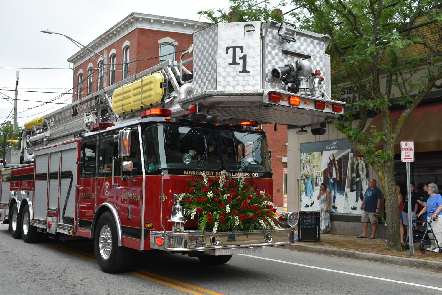 Warren Tower 1 travels north on Main Street during last year’s parade.