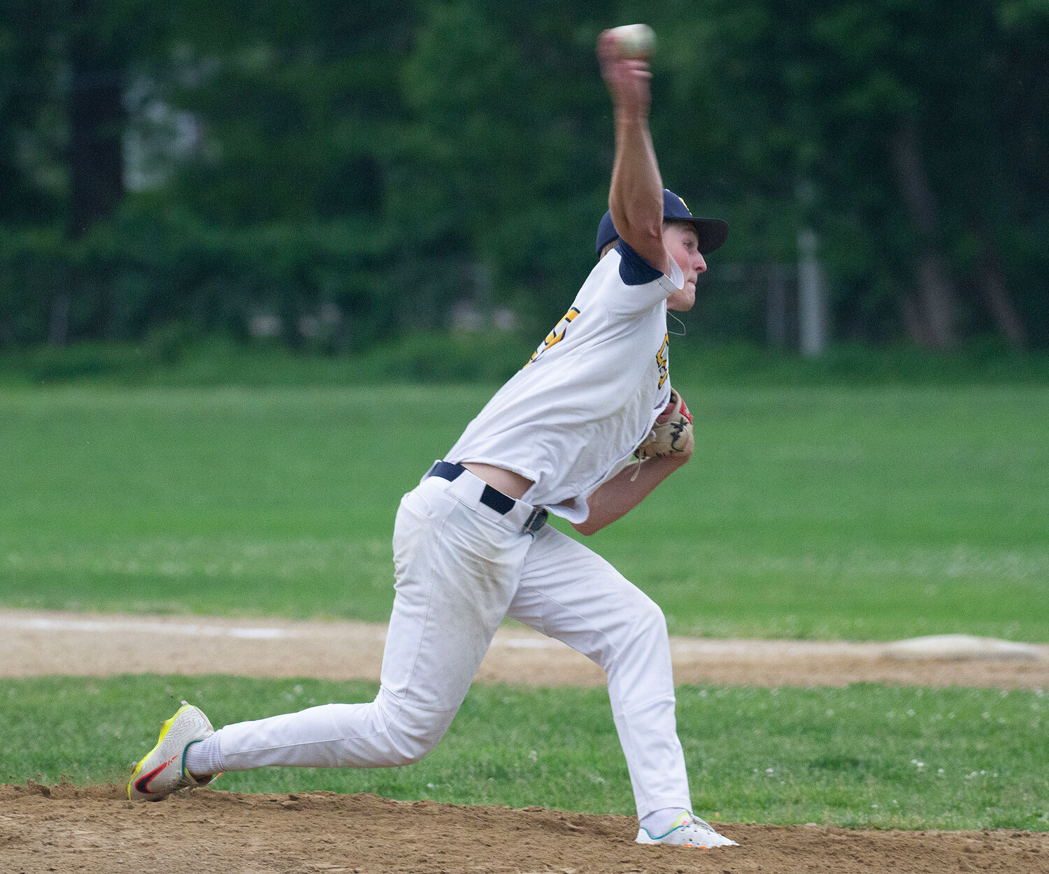 The Eagles' Harrison Cooley, shown pitching in an earlier playoff game, struck out seven East Greenwich batters in Barrington's 5-4 victory on Wednesday, June 7.