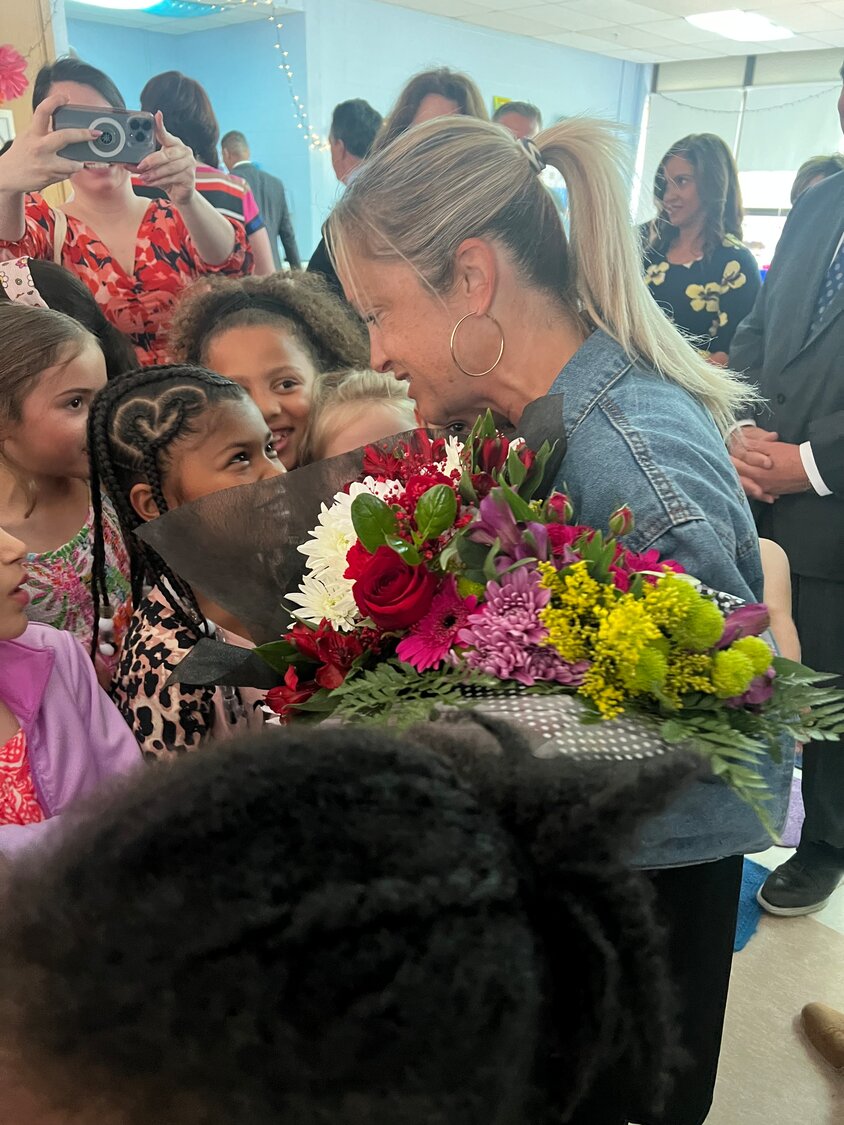 Aimee Couto shared a moment with her Whiteknact students after being named Rhode Island Teacher of the Year.