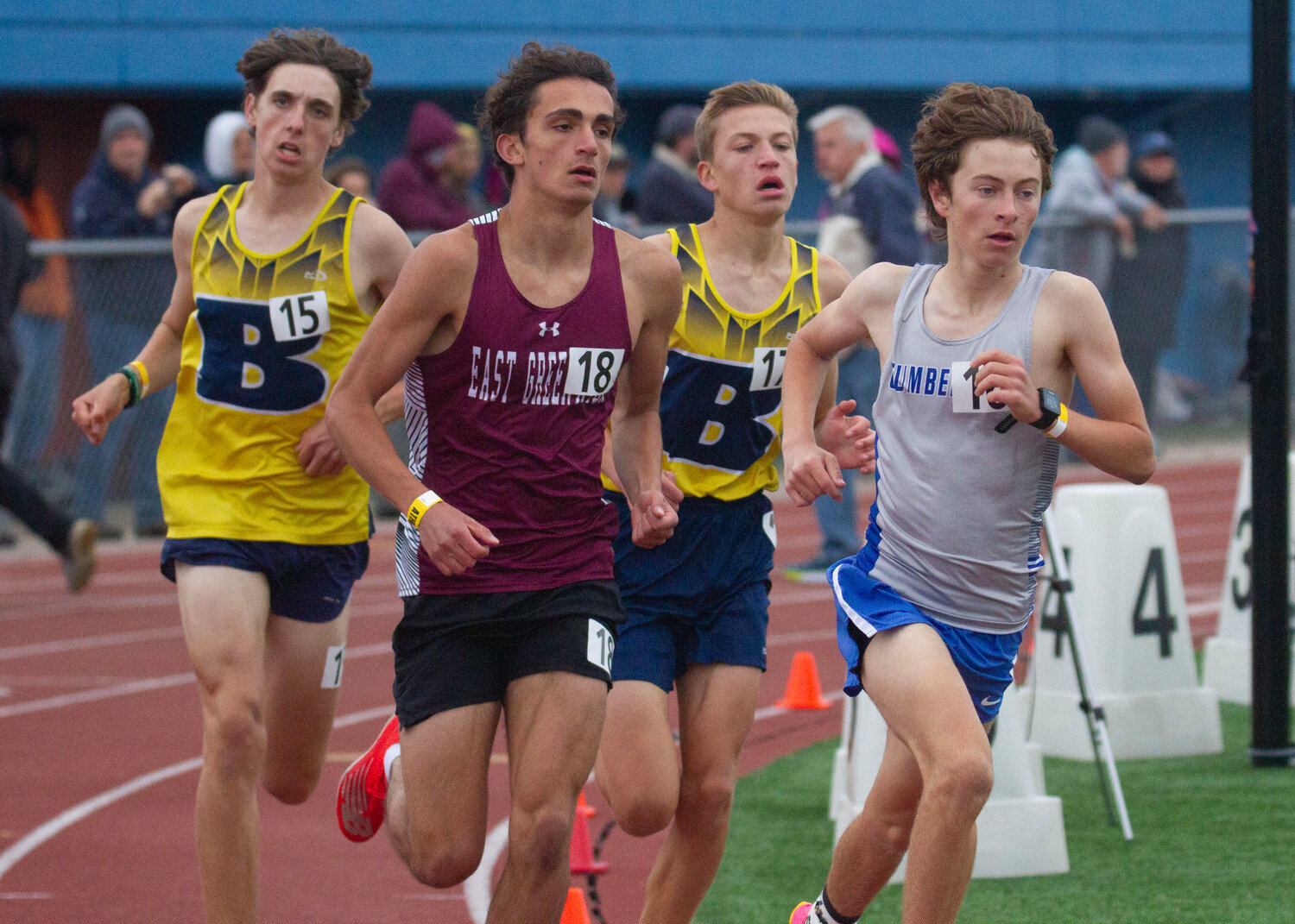 Barrington's Myles Napolitano (left) and Finn Myatt (second from right) compete in the 3,000-meter race at the state track meet on Saturday.