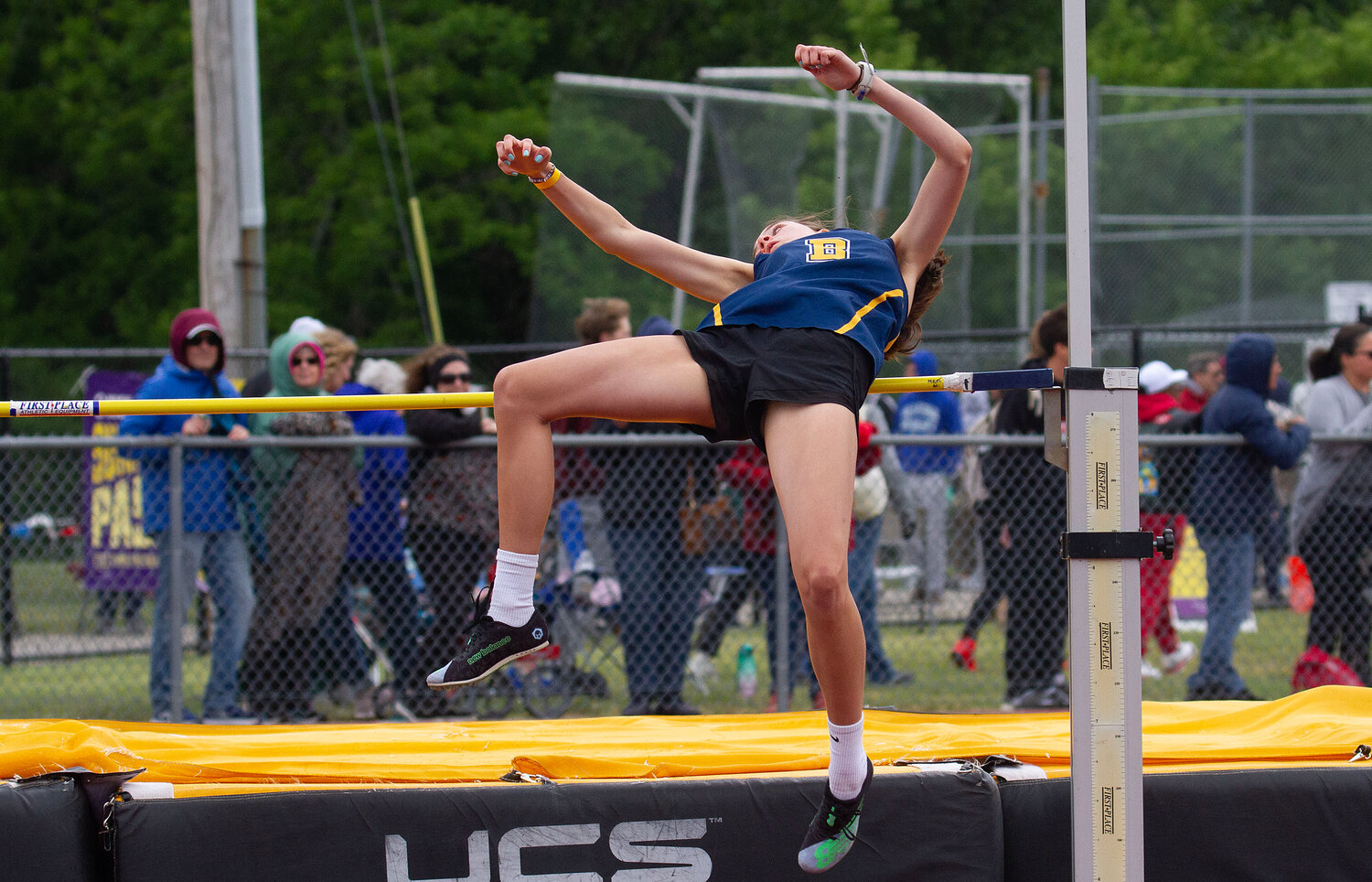 Barrington's Helena Hyde clears the bar in the high jump at states.