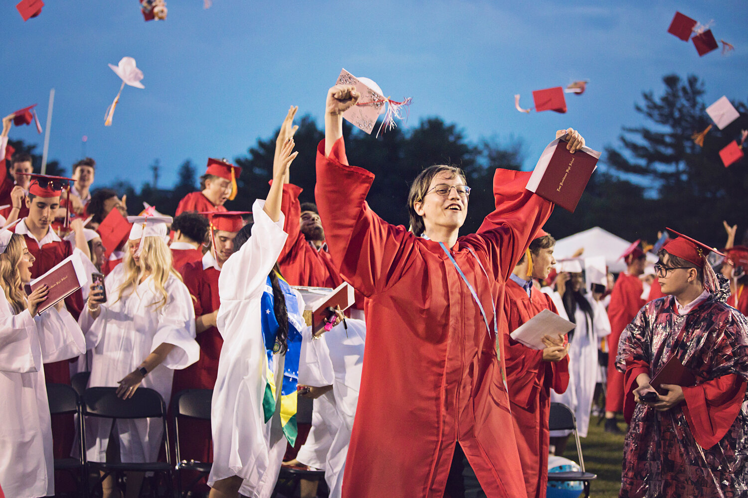 Julie Furtado
Tyler Anctil raises his arm as he and his classmates celebrate at the end of the East Providence High School commencement exercises for the Class of 2023 Friday evening, June 2, at Pierce Memorial Stadium.