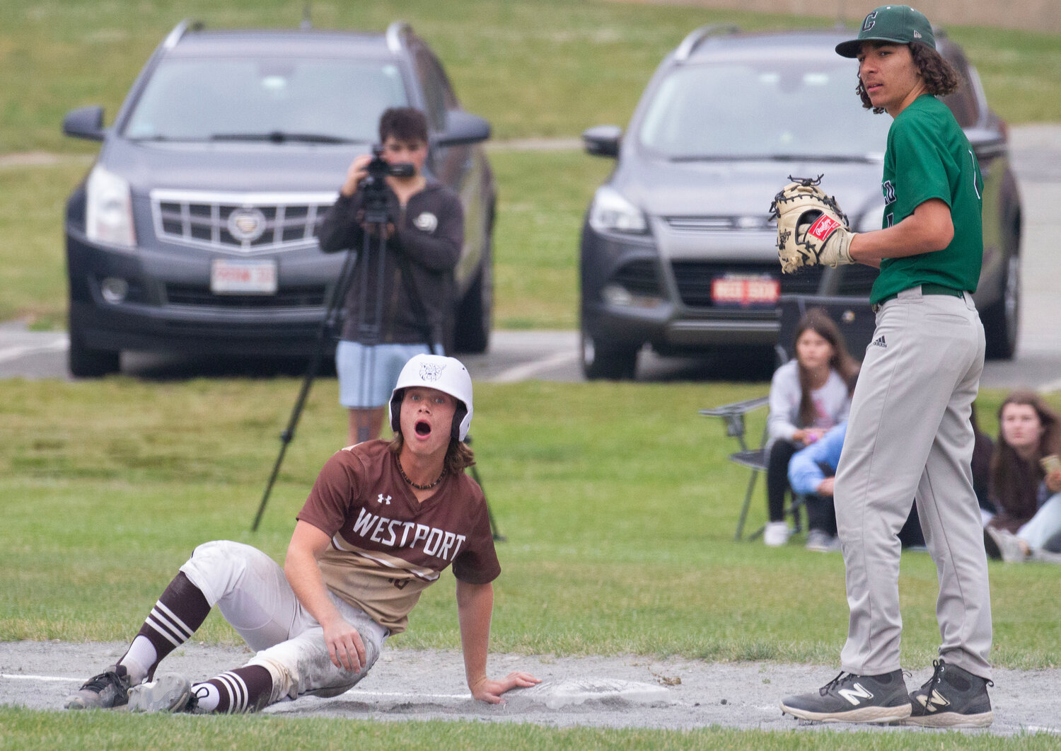 Noah Sowle gets picked off of first base by Greenfield pitcher Mike Pierce.